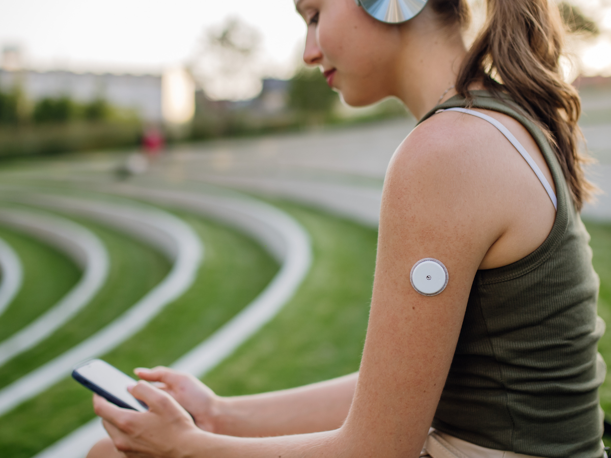 woman using a CGM
